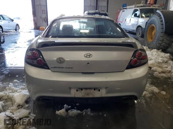 2008 Hyundai Tiburon GS с VIN KMHHM66D68U292449, выставлен на аукционе Copart как лот 86752214 с пробегом 251 711 миль миль и Списание • Salvage title. История ставок и продаж доступна на DreamBid. Изображение 6.