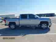2018 Chevrolet Silverado 1500 LT with VIN 3GCUKREC4JG339988, listed as a IAAI auction lot 43222960 with 162,440 mi miles and . Bid and sale history available at DreamBid. Image 13.