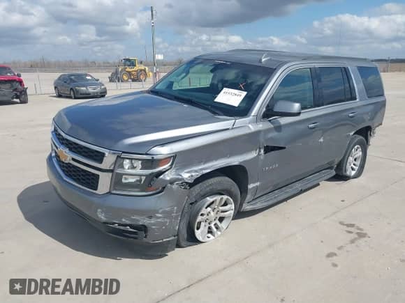 2019 Chevrolet Tahoe LS with VIN 1GNSKAKC7KR347704, listed as a IAAI auction lot 41532849 with 219,466 mi miles and . Bid and sale history available at DreamBid. Image 2.
