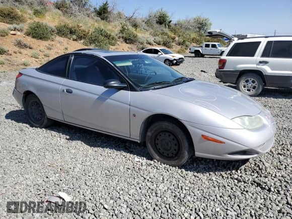 2001 Saturn SC с VIN 1G8ZP12891Z219977, выставлен на аукционе Copart как лот 60248255 с пробегом 230 514 миль миль и Списание • Salvage title. История ставок и продаж доступна на DreamBid. Изображение 4.