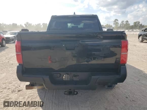 2024 Toyota Tacoma SR с VIN 3TYKD5HNXRT015274, выставлен на аукционе Copart как лот 89548525 с пробегом 16 536 миль миль и Списание • Salvage title. История ставок и продаж доступна на DreamBid. Изображение 6.