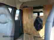 2009 Chevrolet Express Passenger z VIN 1GAHG39K891171907, wystawiony jako Copart lot #69014365 z przebiegiem 182 212 mil mil oraz Czysty tytuł • Clean title. Historia ofert i sprzedaży dostępna na DreamBid. Obrazek 10.