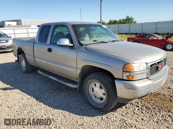 2001 GMC Sierra 1500 SLE с VIN 1GTEK19T21E114136, выставлен на аукционе Copart как лот 70085495 с пробегом 211 655 миль миль и Списание • Salvage title. История ставок и продаж доступна на DreamBid. Изображение 4.