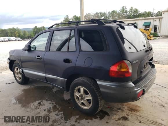 2004 Hyundai Santa Fe GLS z VIN KM8SC13D84U748073, wystawiony jako Copart lot #74749424 z przebiegiem 216 354 mil mil oraz Szkoda całkowita • Salvage title. Historia ofert i sprzedaży dostępna na DreamBid. Obrazek 2.