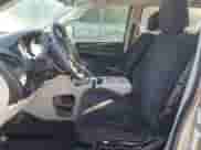 2013 Dodge Grand Caravan SXT with VIN 2C4RDGCG1DR575507, listed as a Copart auction lot 80065985 with 185,478 mi miles and Salvage title. Bid and sale history available at DreamBid. Image 7.