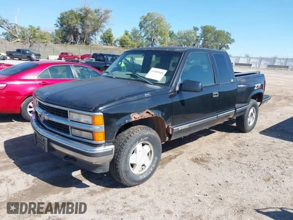 1997 Chevrolet Silverado 1500 with VIN 2GCEK19R5V1180353, listed as a IAAI auction lot 43385908 with 231,909 mi miles and . Bid and sale history available at DreamBid. Image 2.
