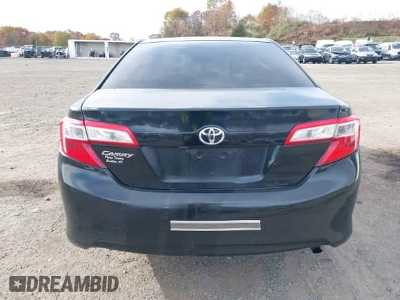 2014 Toyota Camry XLE with VIN 4T4BF1FK2ER354562, listed as a IAAI auction lot 43554838 with 197,062 mi miles and . Bid and sale history available at DreamBid. Image 19.