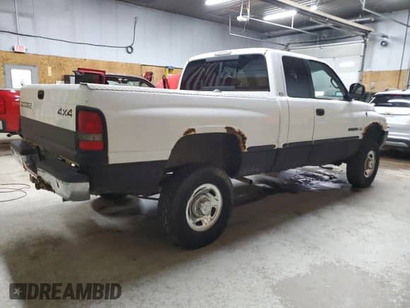 1999 Dodge 2500 with VIN 3B7KF23Z5XG126714, listed as a Copart auction lot 61977325 with 198,740 mi miles and Clean title. Bid and sale history available at DreamBid. Image 3.