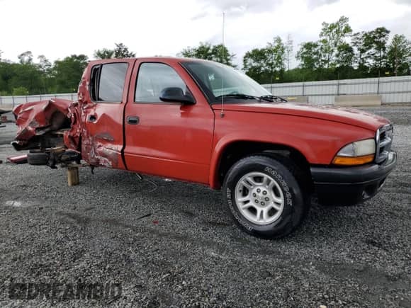 2004 Dodge Dakota Sport с VIN 1D7HL38KX4S685089, выставлен на аукционе Copart как лот 54729285 с пробегом 243 921 миль миль и На запчасти • Non repairable. История ставок и продаж доступна на DreamBid. Изображение 4.