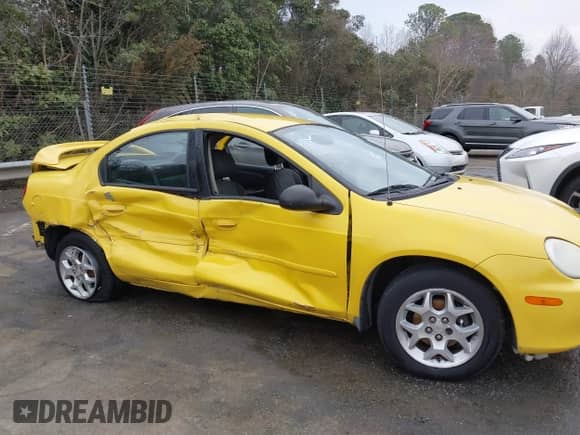 2002 Dodge Neon ES z VIN 1B3ES56C92D591697, wystawiony jako IAAI lot #41686465 z przebiegiem 183 343 mil mil oraz . Historia ofert i sprzedaży dostępna na DreamBid. Obrazek 16.