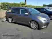 2012 Toyota Sienna XLE AAS with VIN 5TDYK3DC7CS275515, listed as a Copart auction lot 63839725 with 149,968 mi miles and Salvage title. Bid and sale history available at DreamBid. Image 4.
