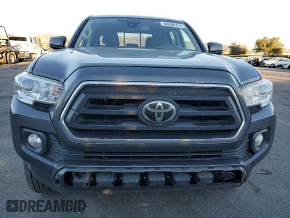 2020 Toyota Tacoma SR5 с VIN 3TMBZ5DN5LM023888, выставлен на аукционе Copart как лот 84208174 с пробегом 131 858 миль миль и Списание • Salvage title. История ставок и продаж доступна на DreamBid. Изображение 5.