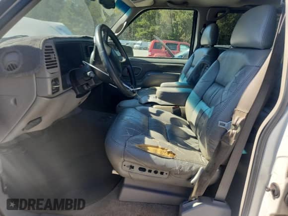 1999 Chevrolet Suburban с VIN 3GNFK16R5XG149629, выставлен на аукционе Copart как лот 90065225 с пробегом 404 104 миль миль и Списание • Salvage title. История ставок и продаж доступна на DreamBid. Изображение 7.