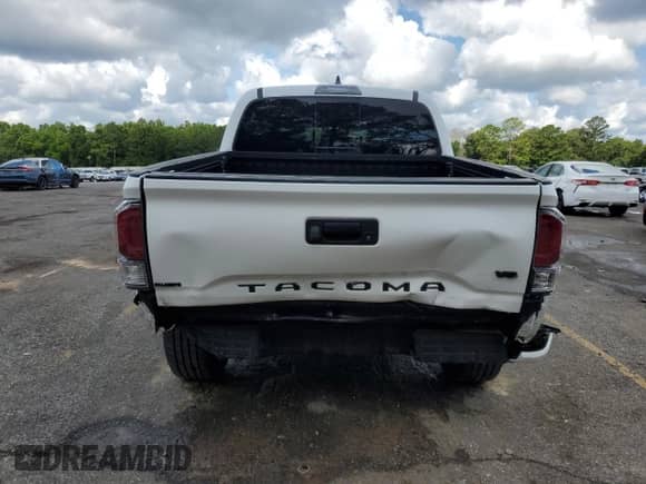2020 Toyota Tacoma TRD Off Road с VIN 3TMCZ5AN4LM323432, выставлен на аукционе Copart как лот 59711425 с пробегом 46 664 миль миль и Списание • Salvage title. История ставок и продаж доступна на DreamBid. Изображение 6.