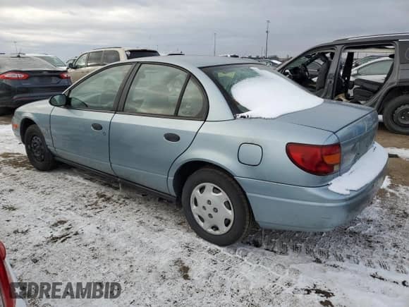 2002 Saturn SL with VIN 1G8ZG52802Z125379, listed as a Copart auction lot 84202294 with 206,776 mi miles and Clean title. Bid and sale history available at DreamBid. Image 2.