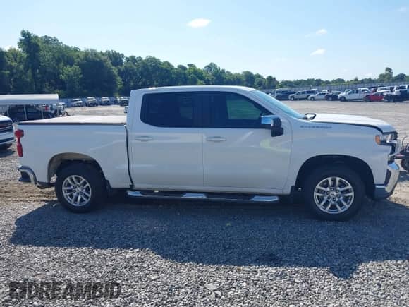 2019 Chevrolet Silverado 1500 LT z VIN 3GCPWCEDXKG186915, wystawiony jako IAAI lot #42566768 z przebiegiem 126 286 mil mil oraz . Historia ofert i sprzedaży dostępna na DreamBid. Obrazek 14.