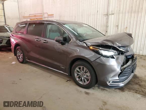 2021 Toyota Sienna XLE z VIN 5TDYRKEC7MS027027, wystawiony jako Copart lot #71498205 z przebiegiem 27 679 mil mil oraz Szkoda całkowita • Salvage title. Historia ofert i sprzedaży dostępna na DreamBid. Obrazek 4.
