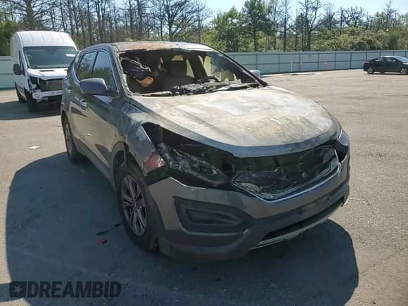 2016 Hyundai Santa Fe с VIN 5XYZTDLB6GG310967, выставлен на аукционе Copart как лот 71545205 с пробегом Не указан миль и Списание • Salvage title. История ставок и продаж доступна на DreamBid. Изображение 14.