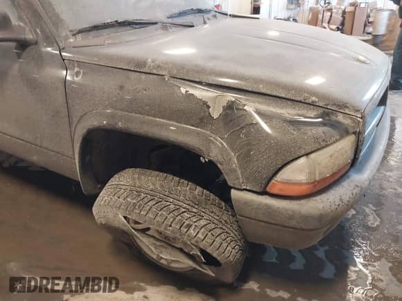 2003 Dodge Dakota Sport with VIN 1D7HG38X53S235378, listed as a IAAI auction lot 41400147 with 112,707 mi miles and . Bid and sale history available at DreamBid. Image 6.
