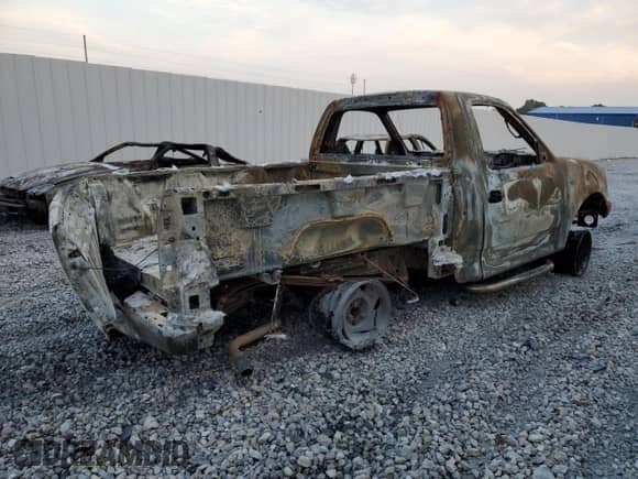 1999 Ford F-150 z VIN 1FTZF0825XKB25411, wystawiony jako Copart lot #69858225 z przebiegiem Nie podano mil oraz Szkoda całkowita • Salvage title. Historia ofert i sprzedaży dostępna na DreamBid. Obrazek 3.