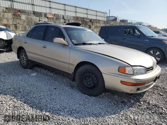 1993 Toyota Camry с VIN 4T1VK13E2PU091221, выставлен на аукционе Copart как лот 63977405 с пробегом 181 754 миль миль и Списание • Salvage title. История ставок и продаж доступна на DreamBid. Изображение 4.