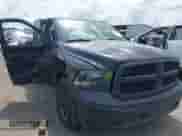 2021 Ram 1500 Tradesman z VIN 1C6RR6FGXMS563885, wystawiony jako IAAI lot #42968841 z przebiegiem 159 324 mil mil oraz . Historia ofert i sprzedaży dostępna na DreamBid. Obrazek 1.