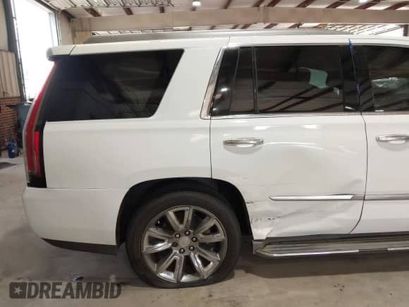 2015 Cadillac Escalade Luxury with VIN 1GYS3MKJ1FR579561, listed as a IAAI auction lot 43325233 with 179,651 mi miles and . Bid and sale history available at DreamBid. Image 6.