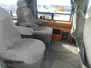 1994 Ford Econoline Cargo with VIN 1FDEE14N5RHC02152, listed as a IAAI auction lot 41803081 with 132,453 mi miles and . Bid and sale history available at DreamBid. Image 8.