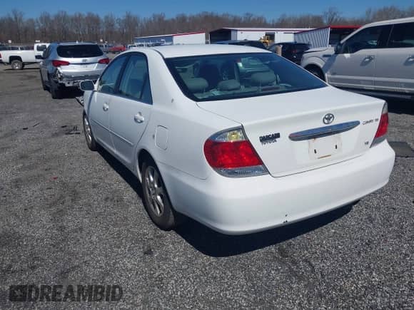 2005 Toyota Camry LE with VIN 4T1BF30K85U088785, listed as a IAAI auction lot 41782321 with 312,552 mi miles and . Bid and sale history available at DreamBid. Image 3.