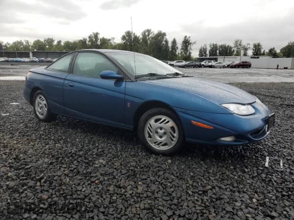 2001 Saturn SC с VIN 1G8ZR12791Z118164, выставлен на аукционе Copart как лот 74393904 с пробегом 158 308 миль миль и Списание • Salvage title. История ставок и продаж доступна на DreamBid. Изображение 4.