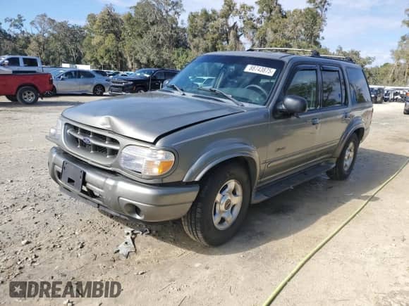 2000 Ford Explorer Limited with VIN 1FMDU75E9YUB50157, listed as a Copart auction lot 88743875 with 184,376 mi miles and Salvage title. Bid and sale history available at DreamBid. Image 1.