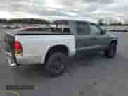 2002 Dodge Dakota SLT with VIN 1B7HG48N92S640009, listed as a Copart auction lot 86245995 with 180,480 mi miles and Salvage title. Bid and sale history available at DreamBid. Image 3.