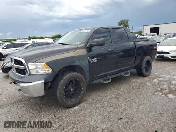 2015 Ram 1500 Tradesman with VIN 1C6RR7KM4FS721352, listed as a Copart auction lot 65731745 with 147,313 mi miles and Salvage title. Bid and sale history available at DreamBid. Image 1.