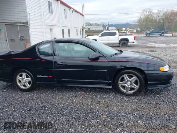 2004 Chevrolet Monte Carlo SS Supercharged z VIN 2G1WZ151449433445, wystawiony jako IAAI lot #41957645 z przebiegiem 288 865 mil mil oraz . Historia ofert i sprzedaży dostępna na DreamBid. Obrazek 13.