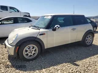 2005 MINI Hardtop with VIN WMWRC33505TJ69512, listed as a Copart auction lot 69698855 with 90,660 mi miles and Salvage title. Bid and sale history available at DreamBid. Image 1.