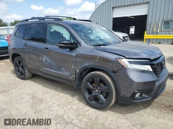2019 Honda Passport Elite with VIN 5FNYF8H01KB005894, listed as a Copart auction lot 58585835 with 98,725 mi miles and Salvage title. Bid and sale history available at DreamBid. Image 4.