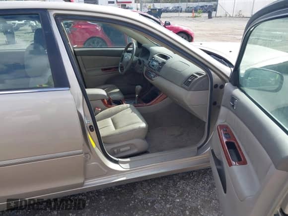 2002 Toyota Camry XLE with VIN JTDBF30K220032817, listed as a IAAI auction lot 43221406 with 108,631 mi miles and . Bid and sale history available at DreamBid. Image 5.
