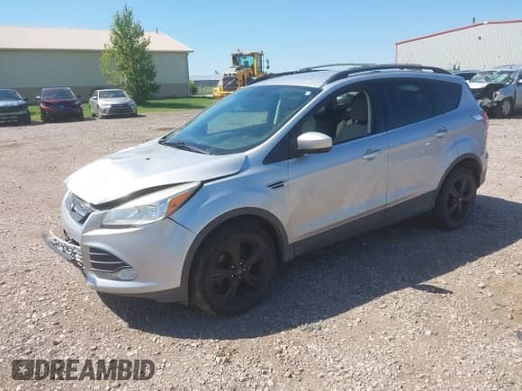 2014 Ford Escape SE z VIN 1FMCU0GX8EUB32407, wystawiony jako IAAI lot #42936937 z przebiegiem 143 936 mil mil oraz . Historia ofert i sprzedaży dostępna na DreamBid. Obrazek 2.