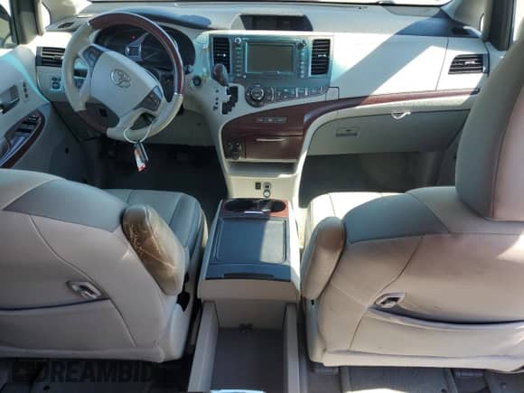 2012 Toyota Sienna XLE AAS with VIN 5TDYK3DC8CS190893, listed as a Copart auction lot 89573505 with 145,575 mi miles and Salvage title. Bid and sale history available at DreamBid. Image 8.