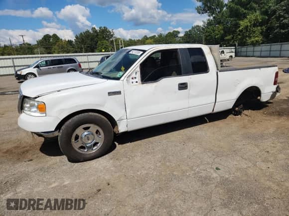 2007 Ford F-150 STX with VIN 1FTRX12W57FA37403, listed as a Copart auction lot 84213265 with 2,342,455 mi miles and Salvage title. Bid and sale history available at DreamBid. Image 1.