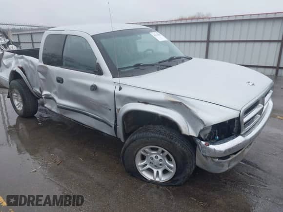 2001 Dodge Dakota Sport with VIN 1B7GG22N31S316805, listed as a IAAI auction lot 42114986 with 91,402 mi miles and . Bid and sale history available at DreamBid. Image 1.