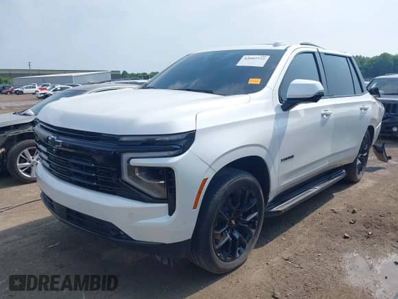2025 Chevrolet Tahoe RST z VIN 1GNS6RRD7SR121714, wystawiony jako IAAI lot #42602552 z przebiegiem 9 824 mil mil oraz . Historia ofert i sprzedaży dostępna na DreamBid. Obrazek 2.