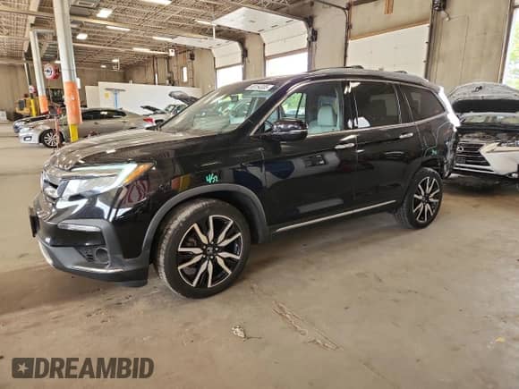 2019 Honda Pilot Touring 7-Passenger with VIN 5FNYF6H60KB008925, listed as a Copart auction lot 68154335 with 115,631 mi miles and Salvage title. Bid and sale history available at DreamBid. Image 1.