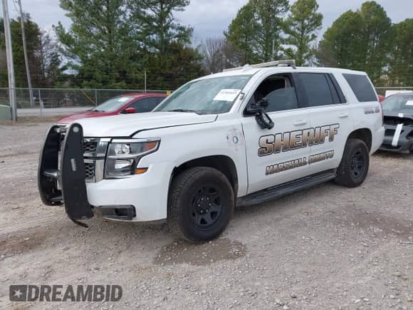 2020 Chevrolet Tahoe Commercial with VIN 1GNLCDEC7LR199179, listed as a IAAI auction lot 41502623 with 87,271 mi miles and . Bid and sale history available at DreamBid. Image 17.