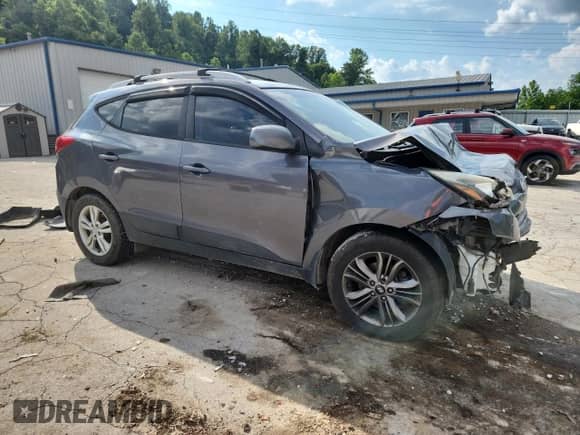 2015 Hyundai Tucson SE z VIN KM8JUCAG9FU991153, wystawiony jako Copart lot #63429555 z przebiegiem 160 649 mil mil oraz Szkoda całkowita • Salvage title. Historia ofert i sprzedaży dostępna na DreamBid. Obrazek 4.