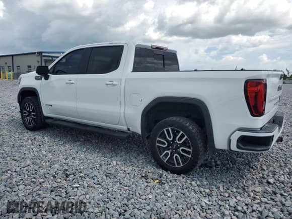 2019 GMC Sierra 1500 AT4 with VIN 3GTP9EED0KG142943, listed as a Copart auction lot 67406785 with 63,232 mi miles and Non repairable. Bid and sale history available at DreamBid. Image 2.