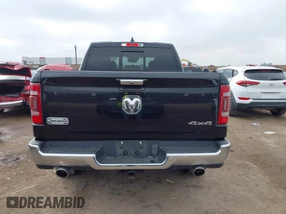 2019 Ram 1500 Longhorn with VIN 1C6SRFKT7KN518337, listed as a IAAI auction lot 41502569 with 76,226 mi miles and . Bid and sale history available at DreamBid. Image 16.