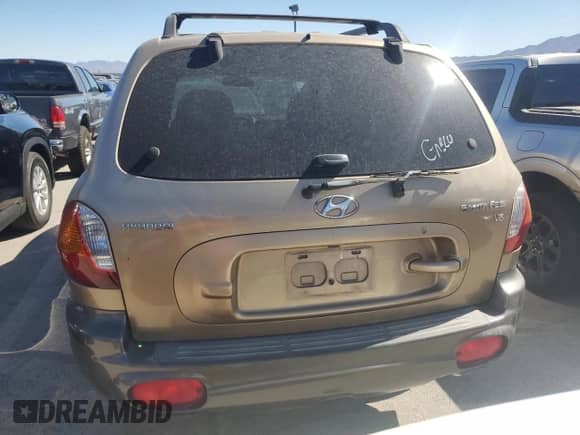 2003 Hyundai Santa Fe GLS z VIN KM8SC13D53U558567, wystawiony jako Copart lot #70406325 z przebiegiem Nie podano mil oraz Nie do naprawy • Non repairable. Historia ofert i sprzedaży dostępna na DreamBid. Obrazek 6.