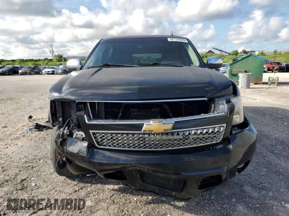 2014 Chevrolet Suburban LTZ with VIN 1GNSCKE07ER166045, listed as a Copart auction lot 68758805 with 162,174 mi miles and Salvage title. Bid and sale history available at DreamBid. Image 5.