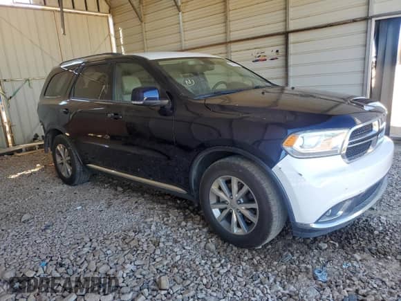 2014 Dodge Durango Limited with VIN 1C4RDHDG6EC489706, listed as a Copart auction lot 84872095 with 148,586 mi miles and Salvage title. Bid and sale history available at DreamBid. Image 4.
